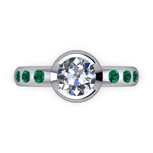 Part bezel set diamond and emerald ring