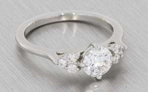 Beautiful Solitaire Engagement ring with Diamond side clusters