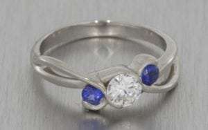 Bespoke diamond and sapphire trilogy engagement ring - Portfolio