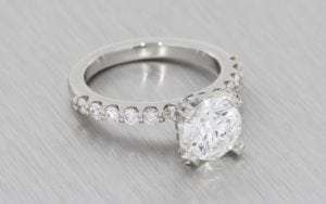 Round Brilliant Cut Engagement Ring With Diamond Shoulders - Portfolio