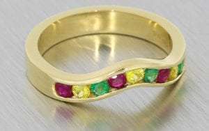 A Distinct Channel Set Ring Set With A Mouth Watering Mix Of Colourful Round Cut Stones