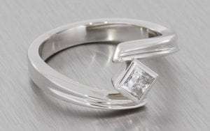 Platinum Princess cut ring set in a groved Bypass shank