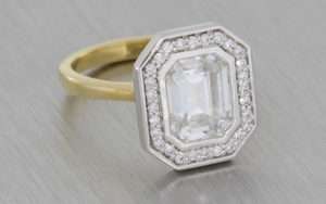 Bezel Set Emerald Halo Engagement Ring
